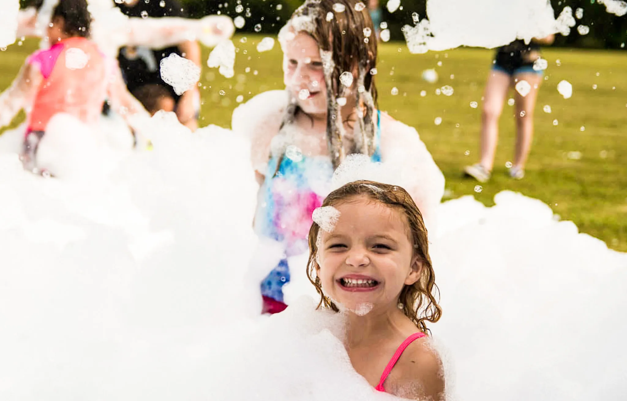foam party vs bounce house for NJ backyard party entertainment with kids playing safely