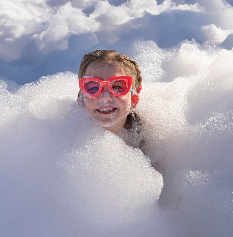 Kids enjoying the inflatable foam pit