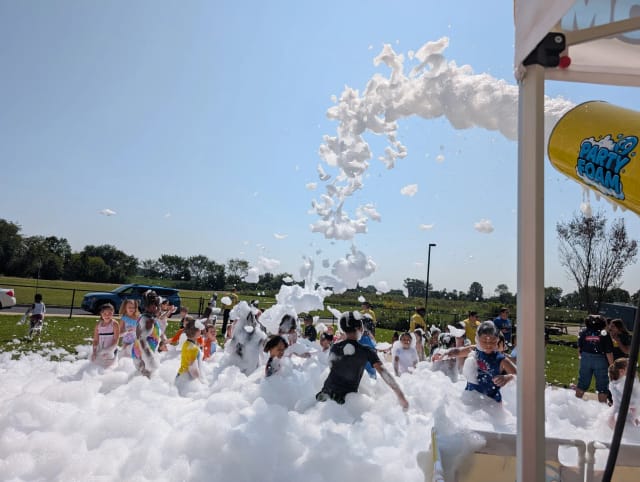 kids and families playing at a foam party during a block party in South Jersey NJ